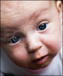 Baby Newborn and First Year Photography - Close up of baby looking at the camera