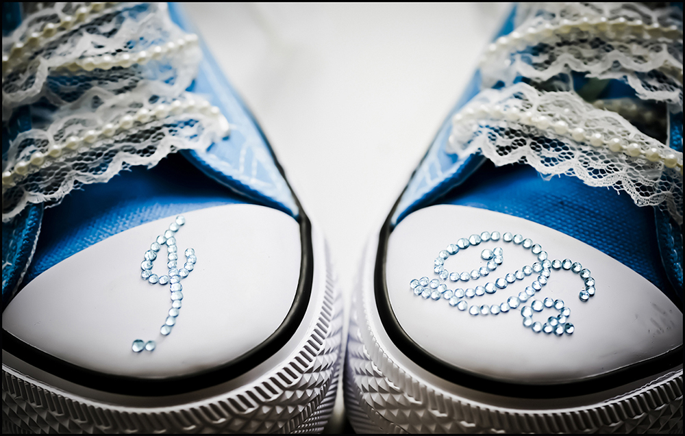 Blue wedding shoes with rhinestone "I Do" photographed in detail by wedding photographer in Burnham, Slough